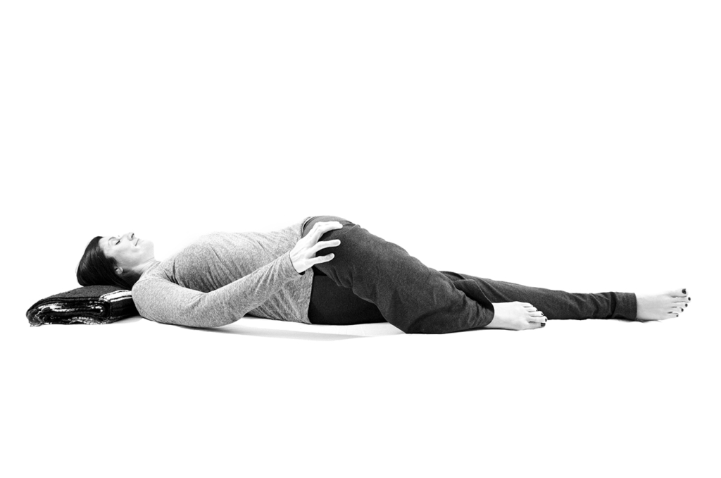 Reclined knee down twist from Yoga for Low Back and Hip Health by Cyndi Roberts