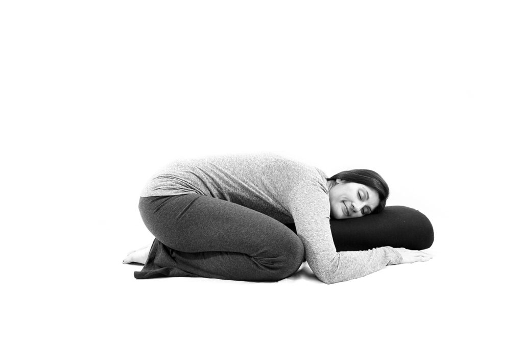 Supported Child's Pose from Yoga for Low Back and Hip Health by Cyndi Roberts